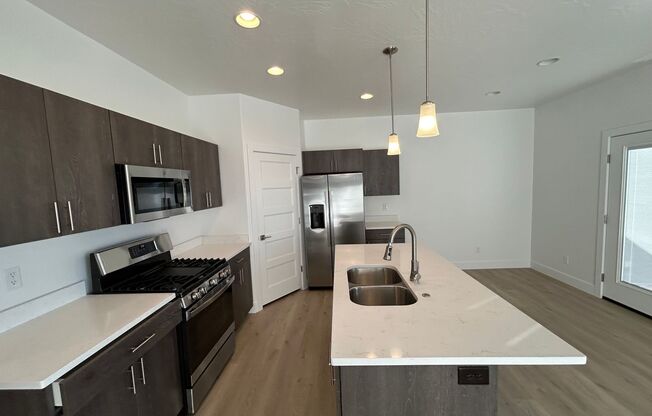 Brand New 3 bed, 2.5 bath, 2 car garage townhome for rent