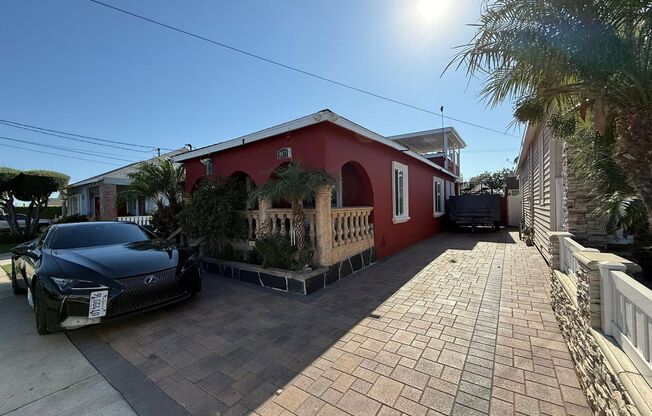 4 bed 3 bath plus 2 Extra Bonus Rooms with full bathroom in the back yard