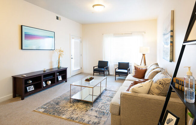 Classic Living Room Design With Television at Four Seasons at Southtowne Apartments, South Jordan, UT, 84095