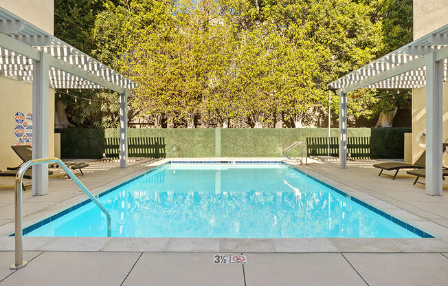 Courtyard pool at Palms Court Apartments