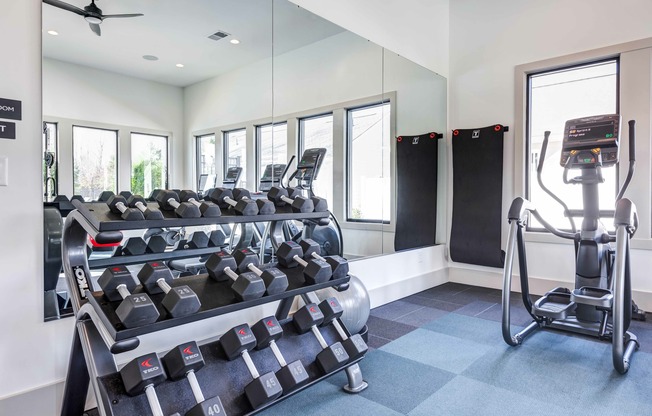 Experience convenience with Sherrills Ford's on-site gym featuring a range of dumbbells. Elevate your workout routine without leaving the comfort of your  community. Your fitness journey begins at home.