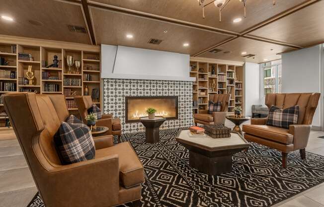 a living room filled with furniture and a fireplace