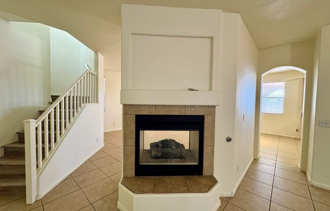 4 bedroom 3 bath home with separate family and living rooms! Tile and vinyl planks throughout as well as a large covered patio!