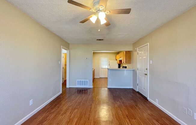 Charming 2 bedroom, 1 bath home with carport and spacious back yard!