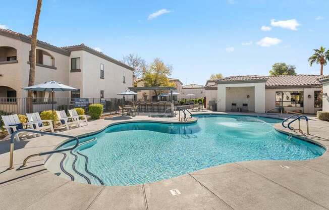 Bayside Apartments in Phoenix, Arizona Pool with Lounge Chairs
