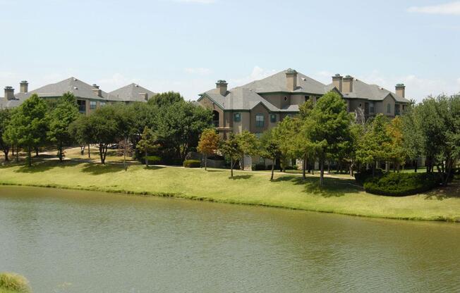 a house next to a body of water