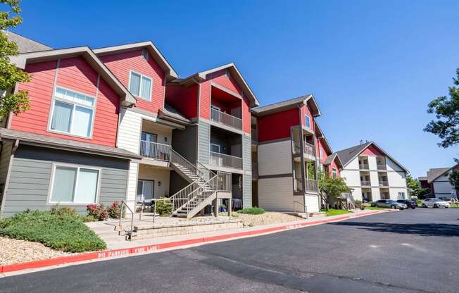 a row of apartments with red and gray roofs at Stetson Meadows Apartments, Colorado, 80922