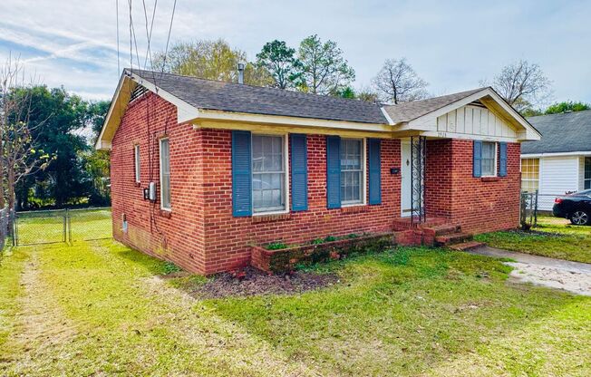 Charming 3-Bedroom Brick Home with Beautiful Hardwoods!