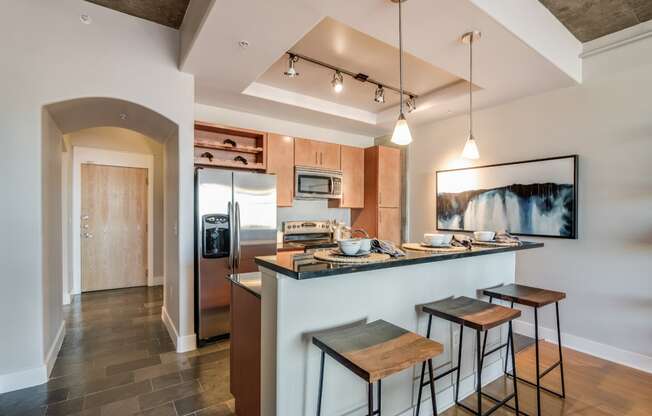 Spacious kitchen islands ideal for entertaining at Crescent at Fells Point by Windsor, Baltimore, MD