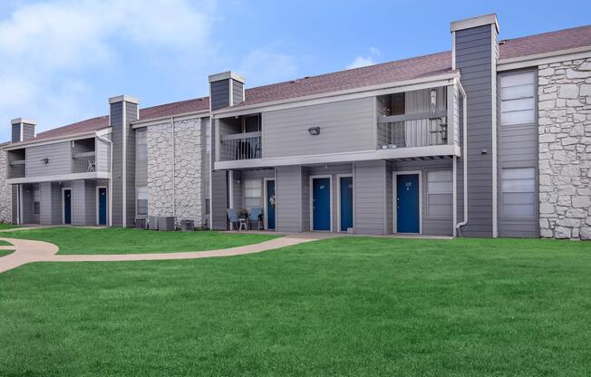 a large lawn in front of a house