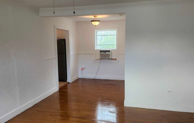 Charming 2-Bed Single-Family Home featuring Hardwood Floors & Huge Yard
