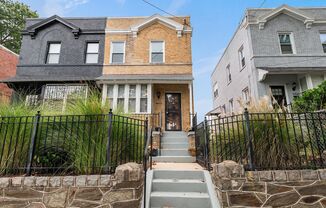 4 bedroom, 2 bath Single Family Home - Corner Row Home with Off Street Parking