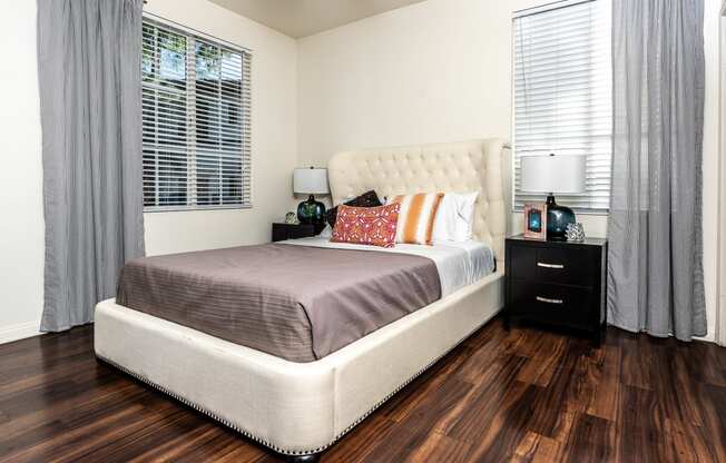 Barrington Place Apartments in Rancho Cucamonga, CA With Hardwood Flooring, Large Windows, and White Walls