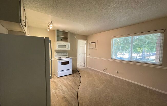 Includes Free Covered and Gated Parking Space!  $1,000 Moves You in Today!