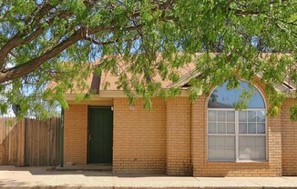 Duplex Across The Street From Costco & Close Access To W. Loop 289!