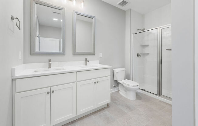 a white bathroom with a urinal and a mirror at Madison Prickett Preserve, Yardley