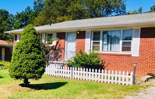 COZY 3/1 BRICK with SUNROOM Available NOW!