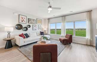 living room with couch and chairs