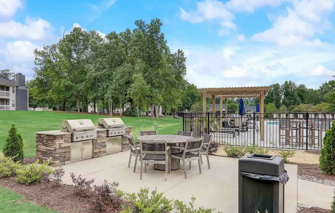 community outdoor grilling area on sunny day