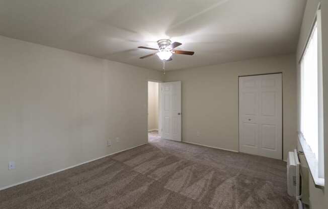 This is a photo of the primary bedroom of the 1004 square foot, 2 bedroom/1 bath Townhome with stackable washer/dryer floor plan at Colonial Ridge Apartments in the Pleasant Ridge neighborhood of Cincinnati, OH.