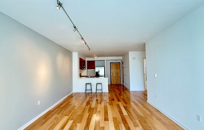 1BR + Den / 1BA with Private Patio + Parking!