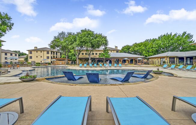 Poolside Relaxing Chairs at The Canyons Apartments, Fort Worth, TX