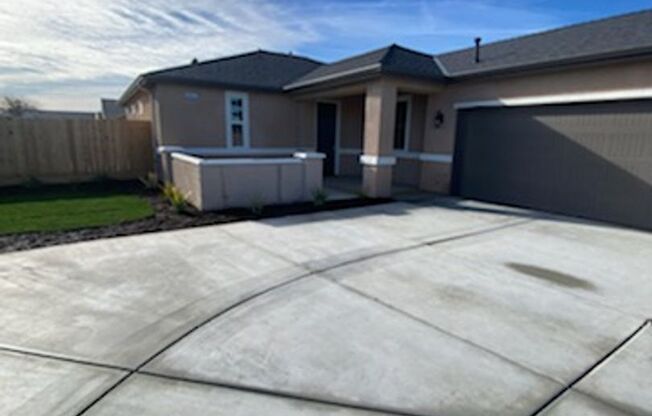 Beautiful Brand New Home in the gated Arbor Gates Subdivision with solar
