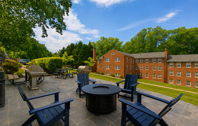 Park Crest Apartments Terrace with Fire Pit and Lounge Chairs