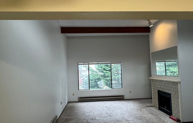 2 Bedroom 1 Bath Burien Condo 995sf, Fireplace, Balcony, One Car Garage with Storage