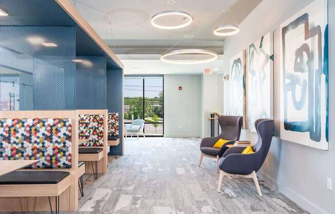 A modern waiting room with a view of the outdoors.