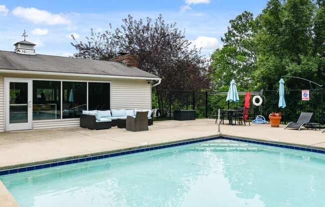 Swimming Pool with Lounge Seats at Heritage Hill Estates Apartments, Cincinnati, Ohio 45227