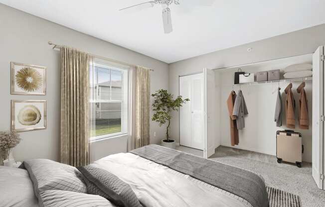 a bedroom with a bed and a closet