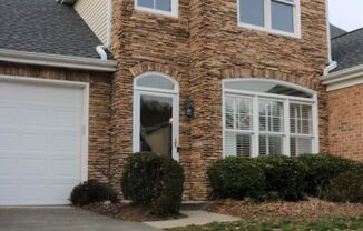 Gorgeous brick 3 bed 2.5 bath town home with fenced yard in Raleigh's Enclave at Inman Park Community.