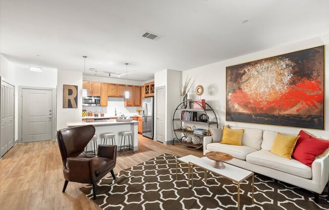 a living room with a couch and a chair