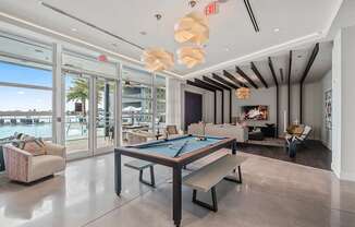 Our two-story lakefront clubhouse features TVs, billiards and an entertainment kitchen