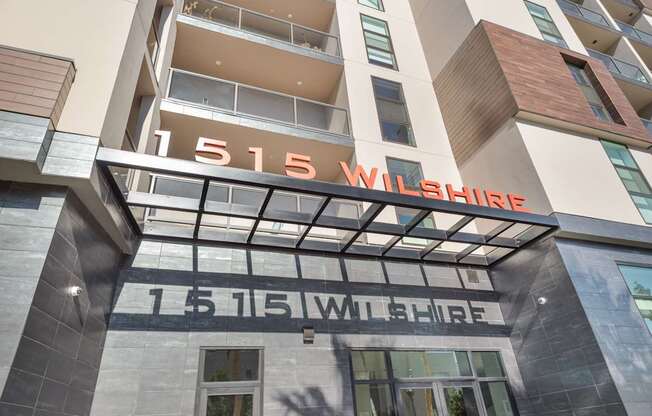 The Wilshire building has a modern design with a glass facade.