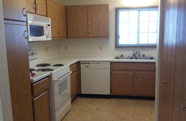 Fully equipped kitchen at Oklahoma Park Townhomes, West Allis, WI,53227