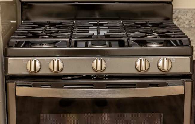 renovated stove  at Windsor House Apartments*, Baltimore, MD, 21220