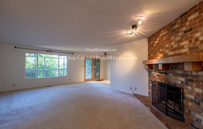 Spacious Home with Attached Garage, Expansive Deck, and Scenic Backyard!