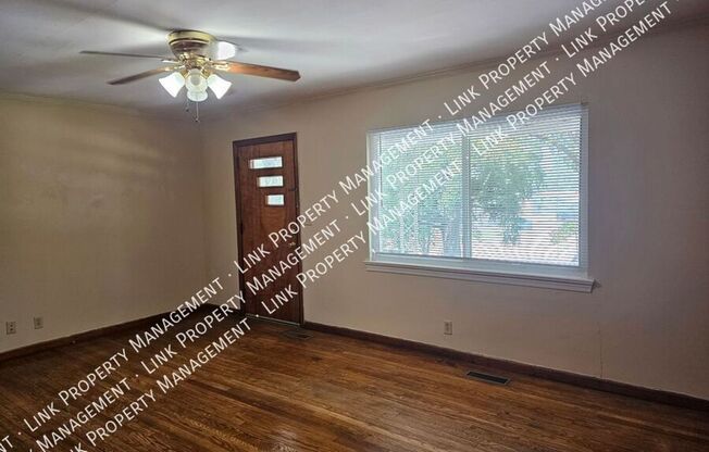 Don't Miss this Charming 2 bedroom with Garage, Large Yard and Storage