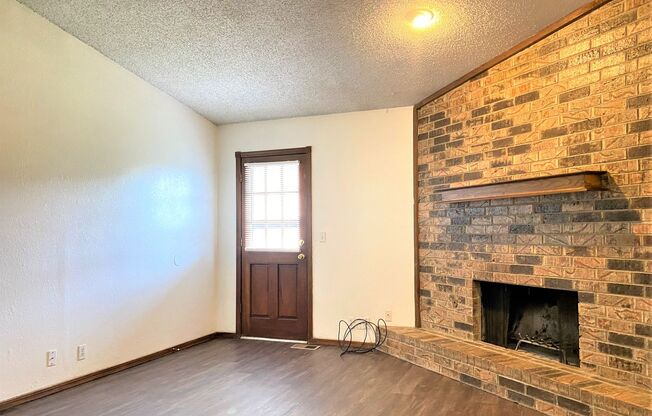 Spacious 3 Bed/2 Bath Duplex with Private Back Patio and 2-Car Garage!