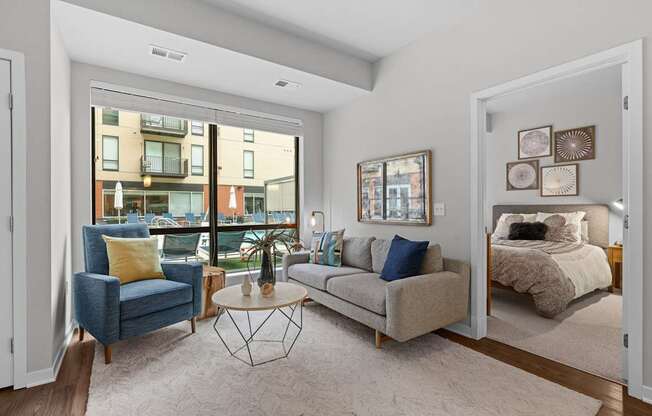 A well-lit, modern living room with a view of the city.