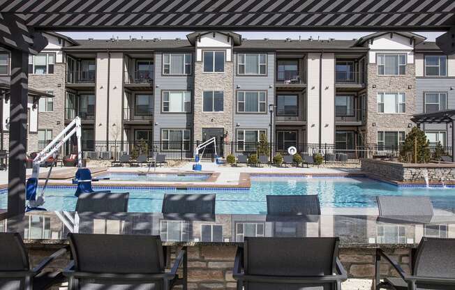 Large Table under Pergola on Outdoor Pool Sundeck