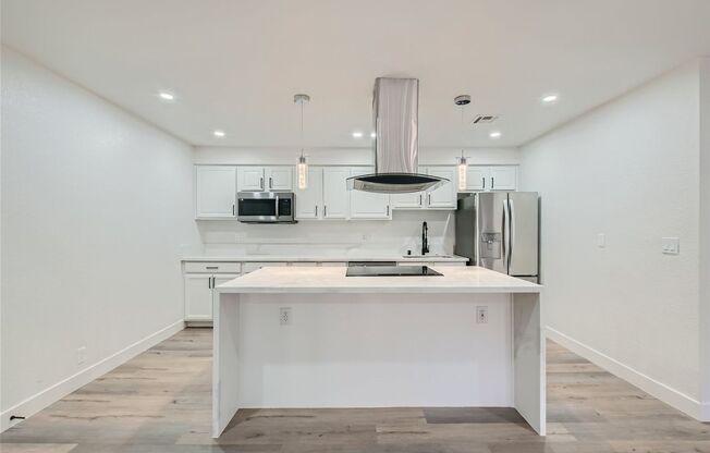 QUALITY DESIGNER Remodeled Condo in a Guard Gated Community!
