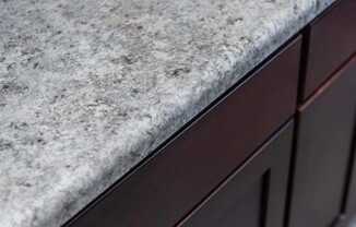 a close up of a granite counter top in a kitchen