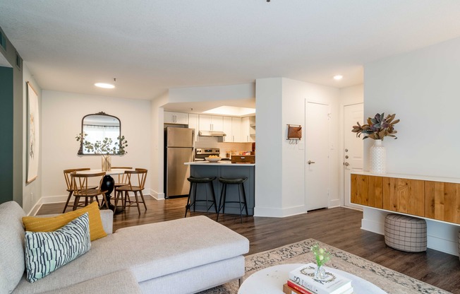 Furnished living room, dining room and kitchen