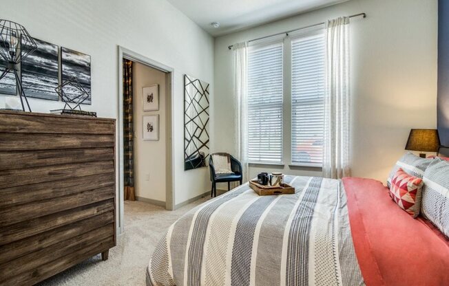 Luxury One-Bedroom Apartments in Rowlett, TX - Harmony Luxury Apartments Bedroom with Large Windows