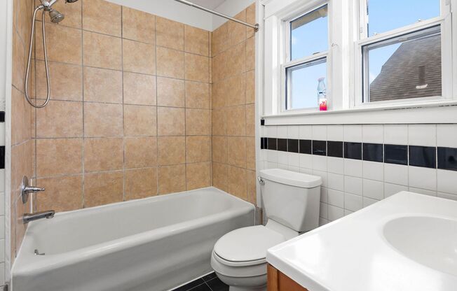 HALF MONTH FREE* Single family home with newly refinished hardwood floors throughout, gas fireplace, off-street parking, garage, private yard and unfinished basement!