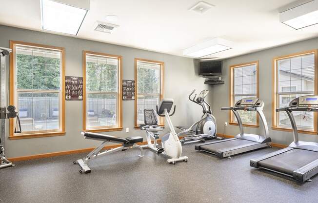 Cardio equipment with flat screen tv - Springbrook Apartments