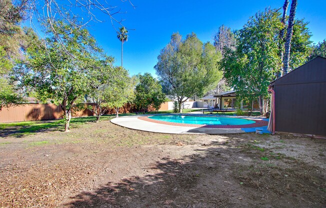 ENTERTAINER'S DELIGHT! GATED ESTATE IN SOUGHT AFTER COLLEGE ACRES!